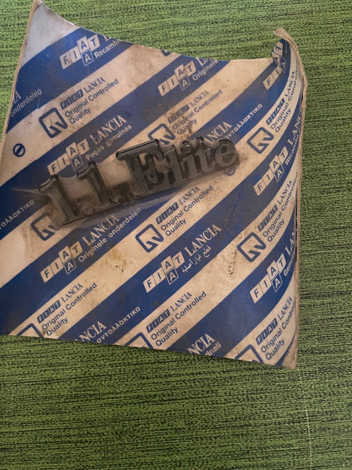 7757729 SCRITTA FREGIO LOGO FIAT AUTOBIANCHI 1100 ELITE